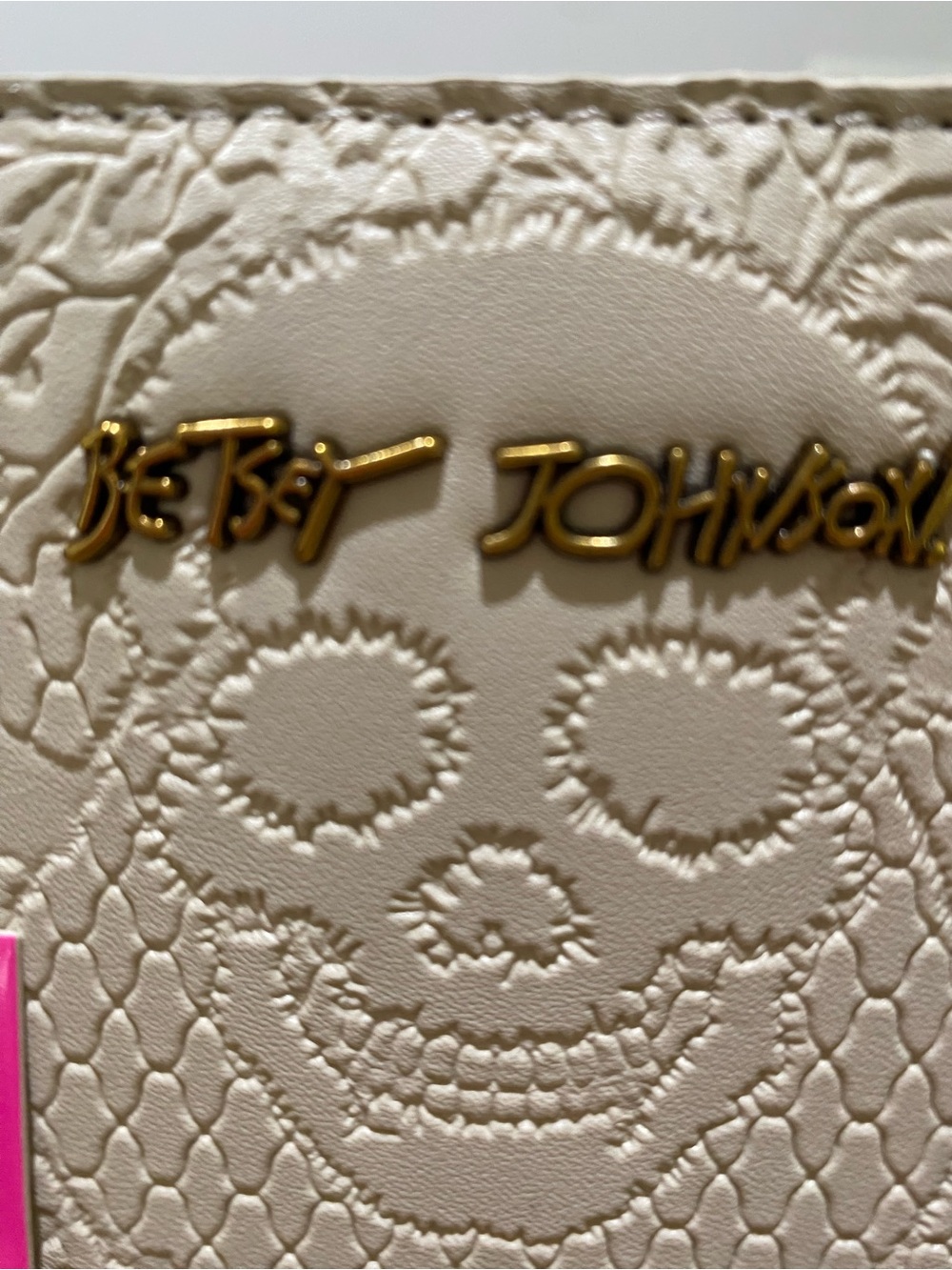NWOT.  Betsey Johnson, cream/brown tote with skulls.